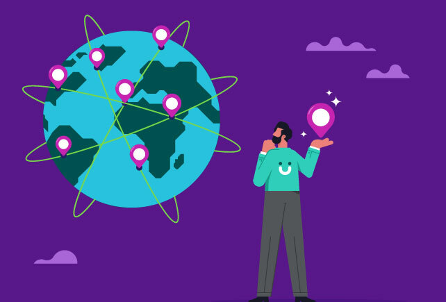 remote employees as dots on a globe with a man standing to the side 